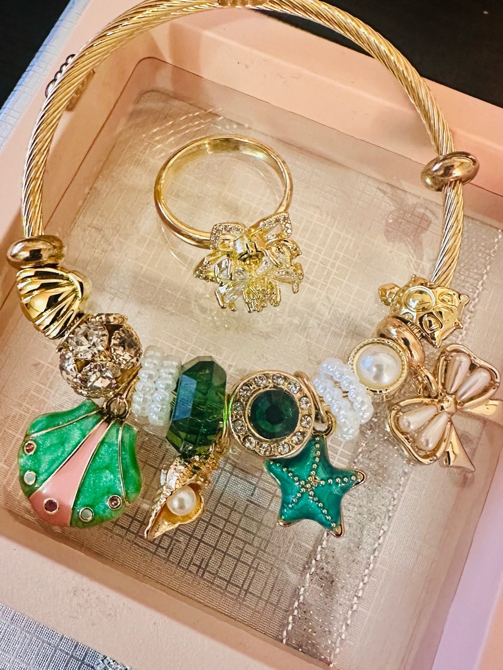 Gold-Tone Green Charm Bracelet with Pearls and Enamel Bow with a ring